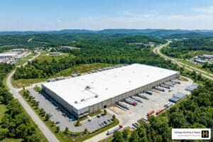 Northwest Arkansas commercial TPO roofing on modern warehouse - Northwest Arkansas commercial TPO roofing