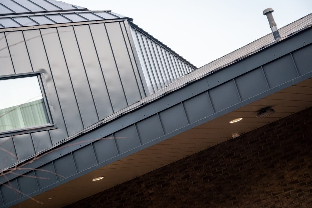 standing seam metal roof on modern home - standing seam metal roof